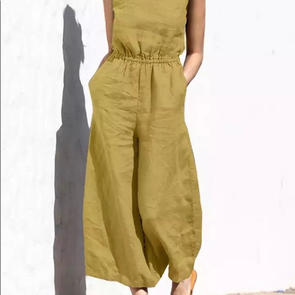 Plus size jumpsuit. Back buttons in mustard color